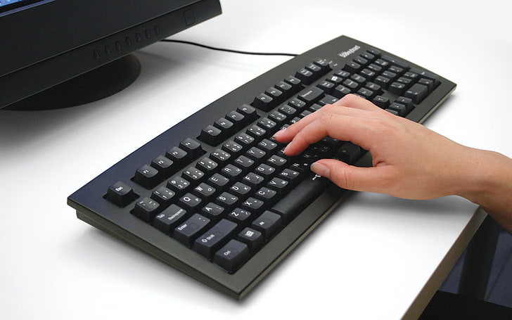 A sleek wireless keyboard with a built-in touchpad